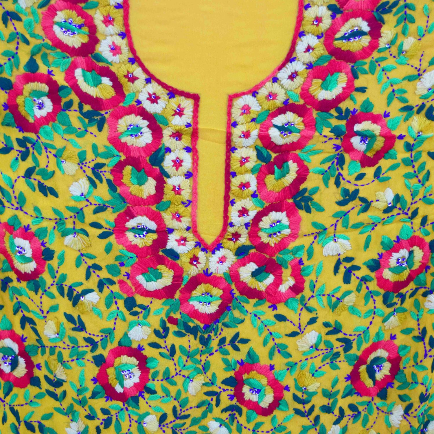 Embroidered Georgette Long Kurti K0385 Traditional embroidery done by the best artisans of India This is a party wear Embroidered kurti which you can wear with a pajami, churidar or salwar. It will look awesome with a palazzo. You can also get it stitched from us as per your own measurements. In case you choose stitching facility while placing your online order, you can upload the measurements and we will then stitch the kurti as per the given measurements.